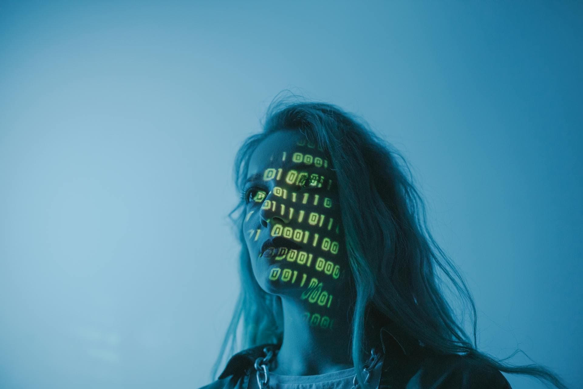 girl with binary code on face